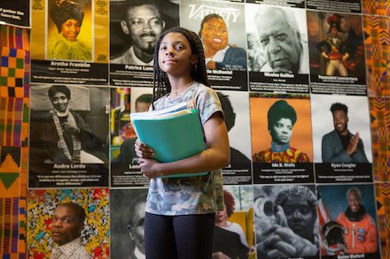 Student holding books